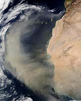 Wind-blown dust from the expanding Sahara Desert reaches far out into the Atlantic Ocean, and eventually North America. Scientists hope to learn how this process, which is linked to climate change, alters the microbial population of the air. Credit: NASA