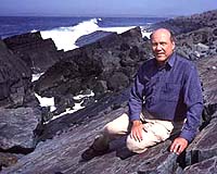 Paeleontologist Guy Narbonne at his Mistaken Point exploration site on the coast of Newfoundland. Photo by Greg Locke