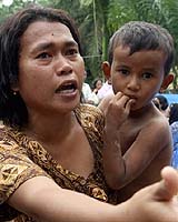 <b>Angry women loot aid post in Indonesia<br></b>Payabedi Indonesia (AFP) Dec 28 - Around a hundred angry and mostly female Indonesian flood victims Thursday looted an aid distribution post, complaining they had not received any food supplies. The mob of mostly mothers carrying their children stormed the government-managed aid post in Aceh Tamiang, the district worst-hit by the floods which have inundated northern Sumatra over the past week.<p>Finding no food, the angry women seized what ever came to hand and made off with plastic buckets and cooking utensils. 