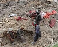Aid boom spurs Afghans to flock to landslide village