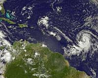 Tropical storms race toward the Caribbean
