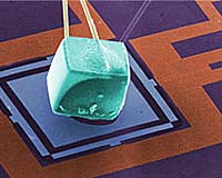 Chip-Scale Refrigerators Cool Bulk Objects