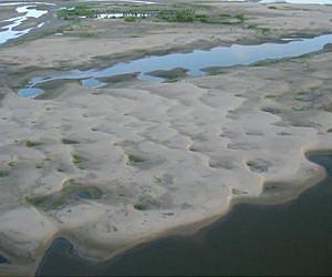 Spillways can divert sand from river to rebuild wetlands
