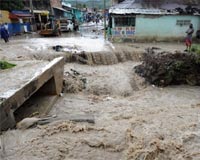 Floods bring despair and devastation to storm-struck Haiti