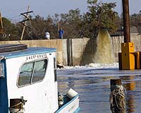 Storm Savaged Louisiana Coastline Still Gripped By Flood Waters