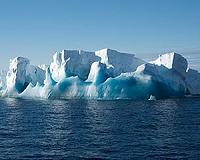 Melting an entire iceberg with a hot poker