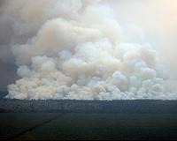 Indonesia water-bombs forest fires to fight haze