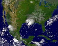 Hurricane batters Texas, storms Louisiana