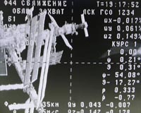 Russian space station resupply rocket launches, docks at ISS