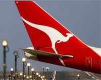 Qantas slashes China, India routes