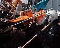 Obama orders probe of police use of military hardware