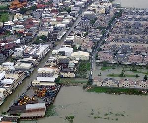 Asia struggles to cope as storms spread destruction
