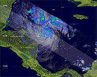 Tropical Storms Endure Over Wet Land, Fizzle Over Dry