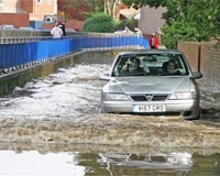 Britain surveys cost of devastating floods