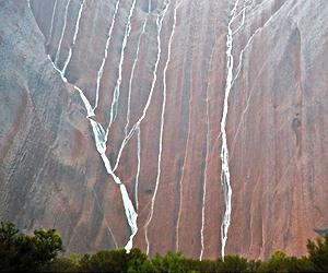 Flooding rains bring rare waterfalls to Australia's Uluru