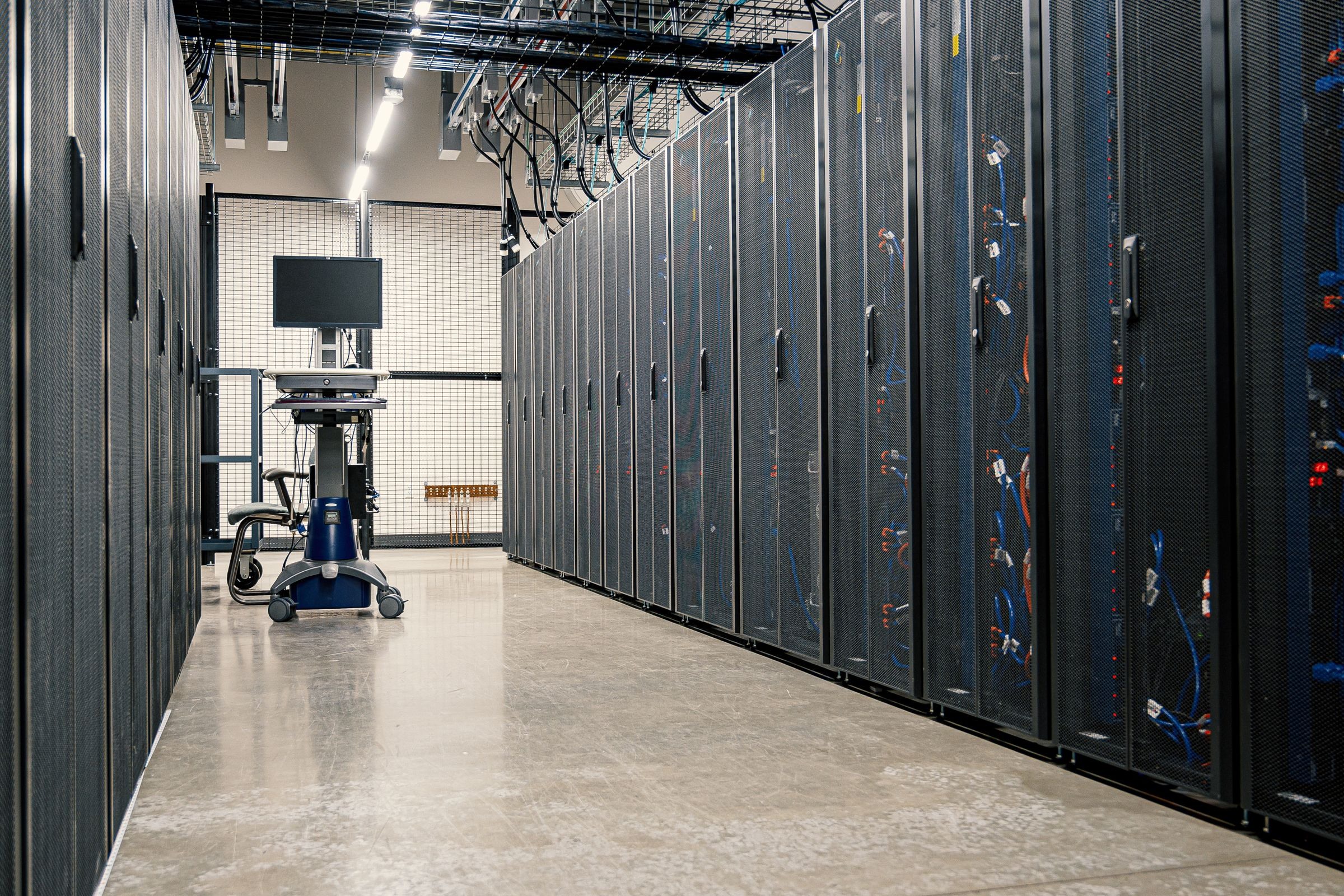 We tend to think of AI as a software problem, weightless and waterless, but even a 100-word email written with ChatGPT has been estimated to require roughly a bottle’s worth of water once data-centre cooling and electricity generation are counted — and scaled to global demand, researchers project AI could withdraw 4.2 to 6.6 billion cubic metres of water a year by 2027, roughly half the United Kingdom’s annual freshwater withdrawals.