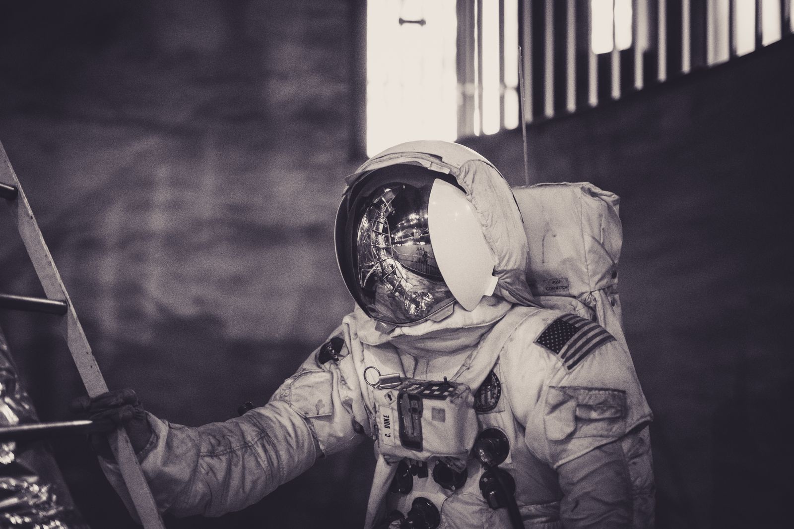 Margaret Hamilton wrote the Apollo 11 guidance software so defensively that when the lunar module's computer flashed 1202 and 1201 alarms during Armstrong's descent, the system automatically shed low-priority tasks and kept the landing radar running, buying the crew the seconds they needed to touch down with 25 seconds of fuel left.